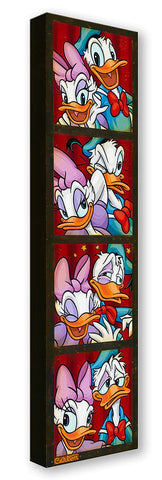 Photo Booth Chaos by Trevor Carlton Treasure On Canvas featuring Donald and Daisy Duck
